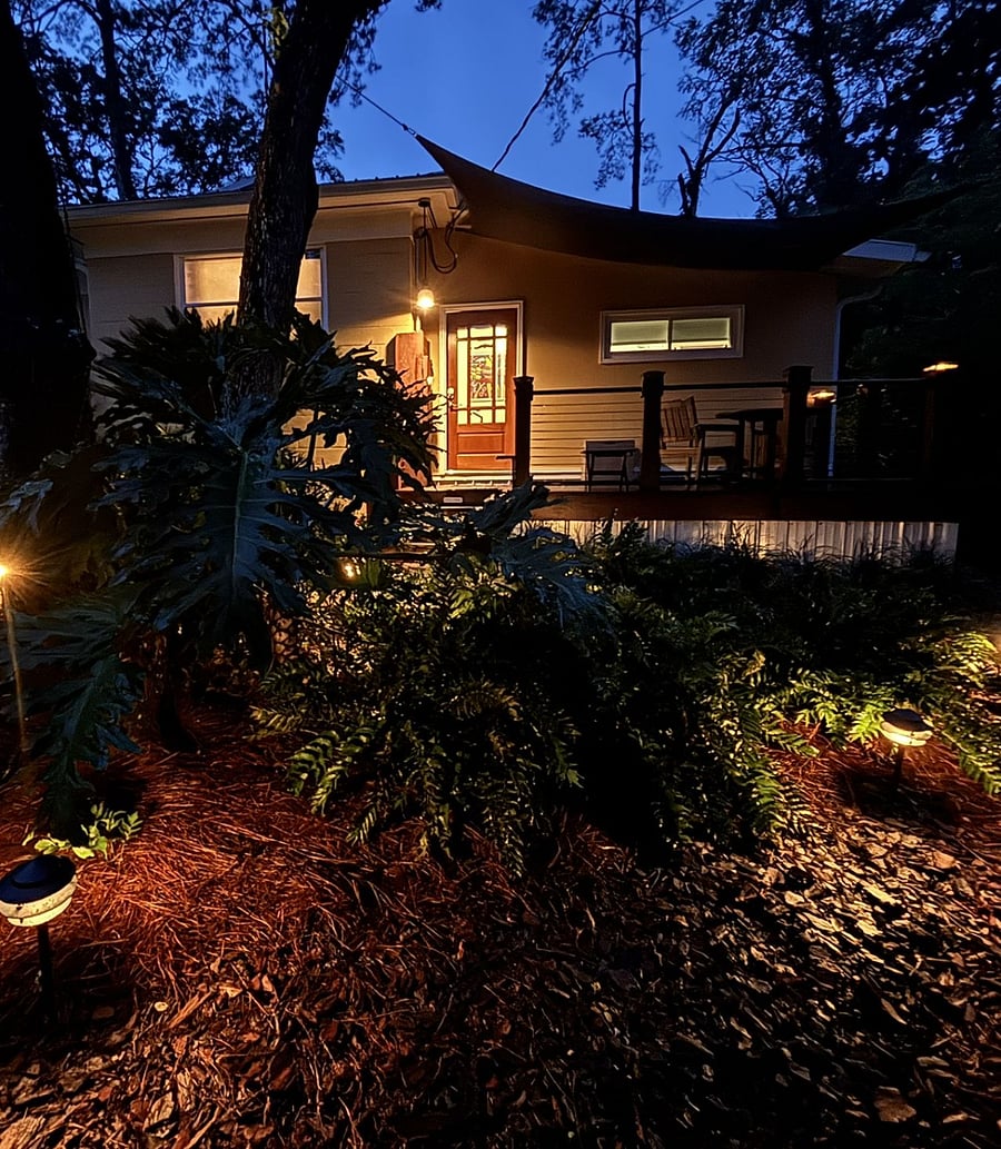 The suite is well-lit with path and porch lights