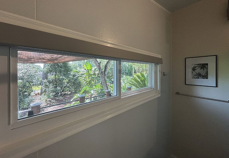 High window across from shower
