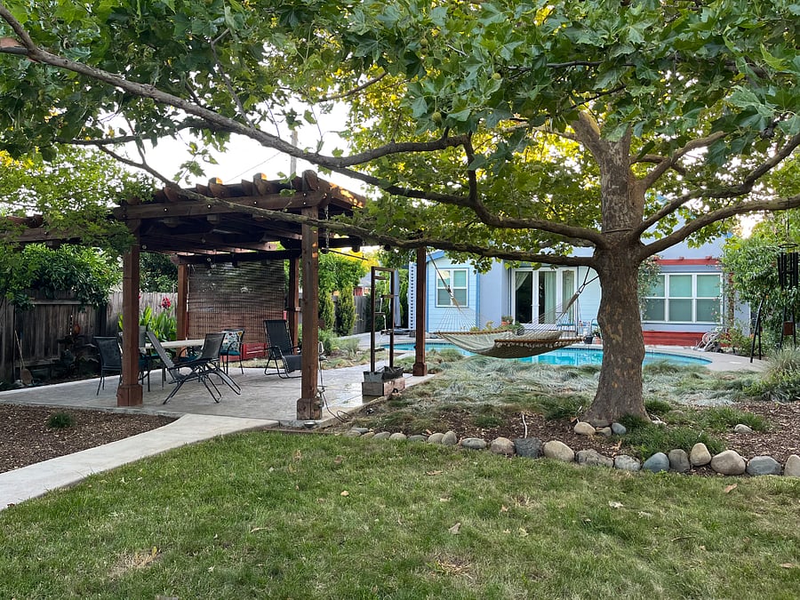 Back yard lounge area with a Zen water feature.