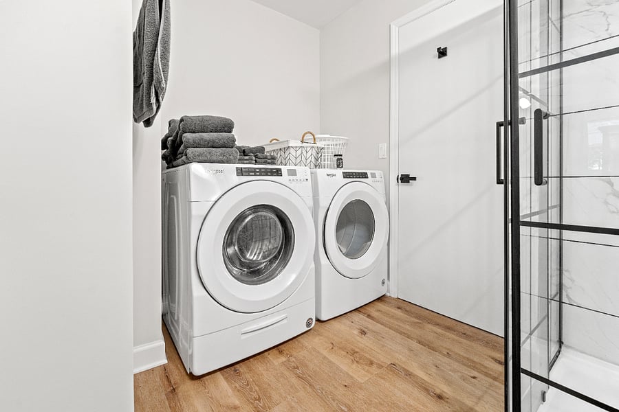 Washer and dryer in Full Bathroom.