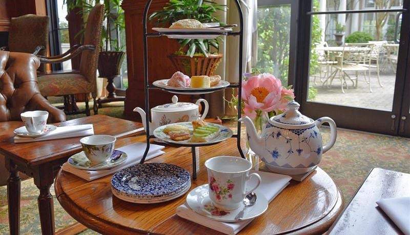 Green Valley Grill has high tea.  Look online for times.