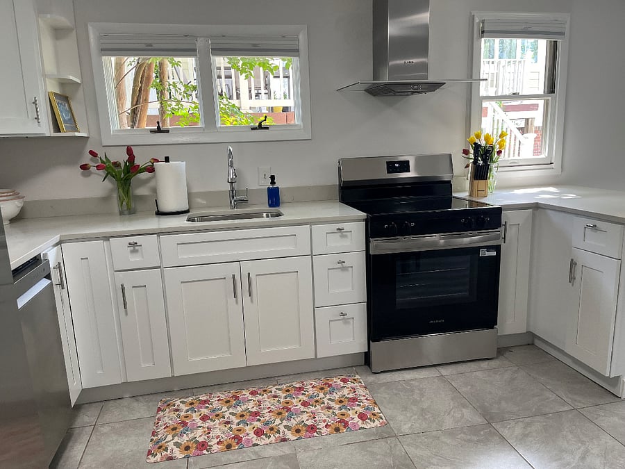 Kitchen set with cutting boards, bowls, knives, measuring cups, silverware, etc.