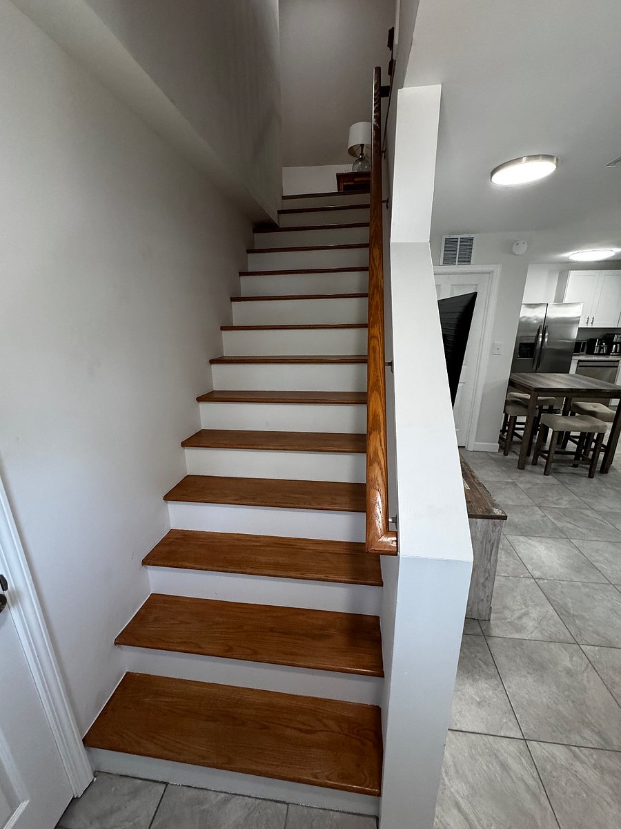 Stairs leading to the second level living room, bedroom and bathroom.