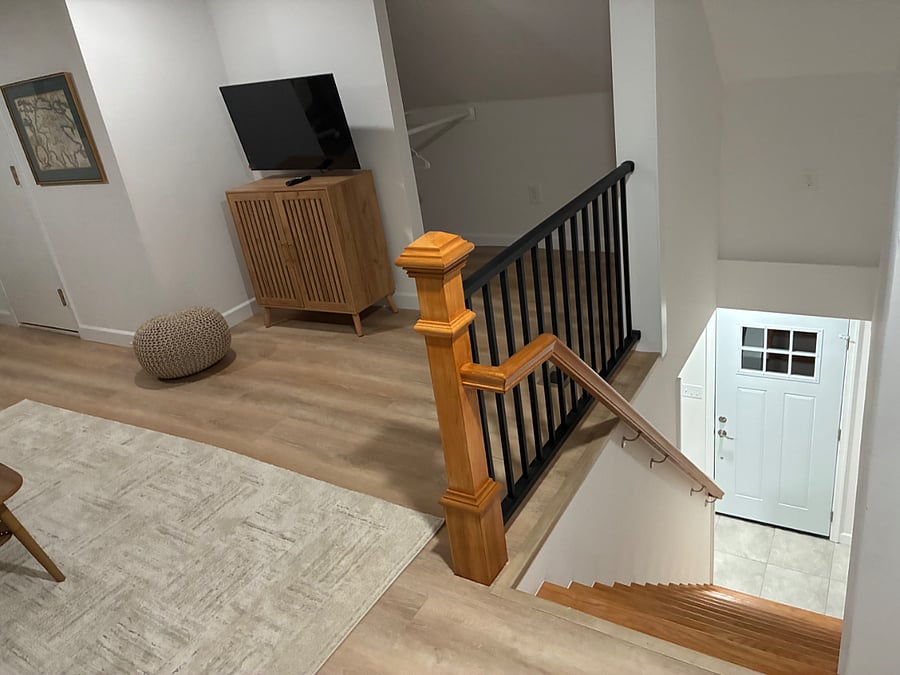 Second level large TV and additional open storage area.