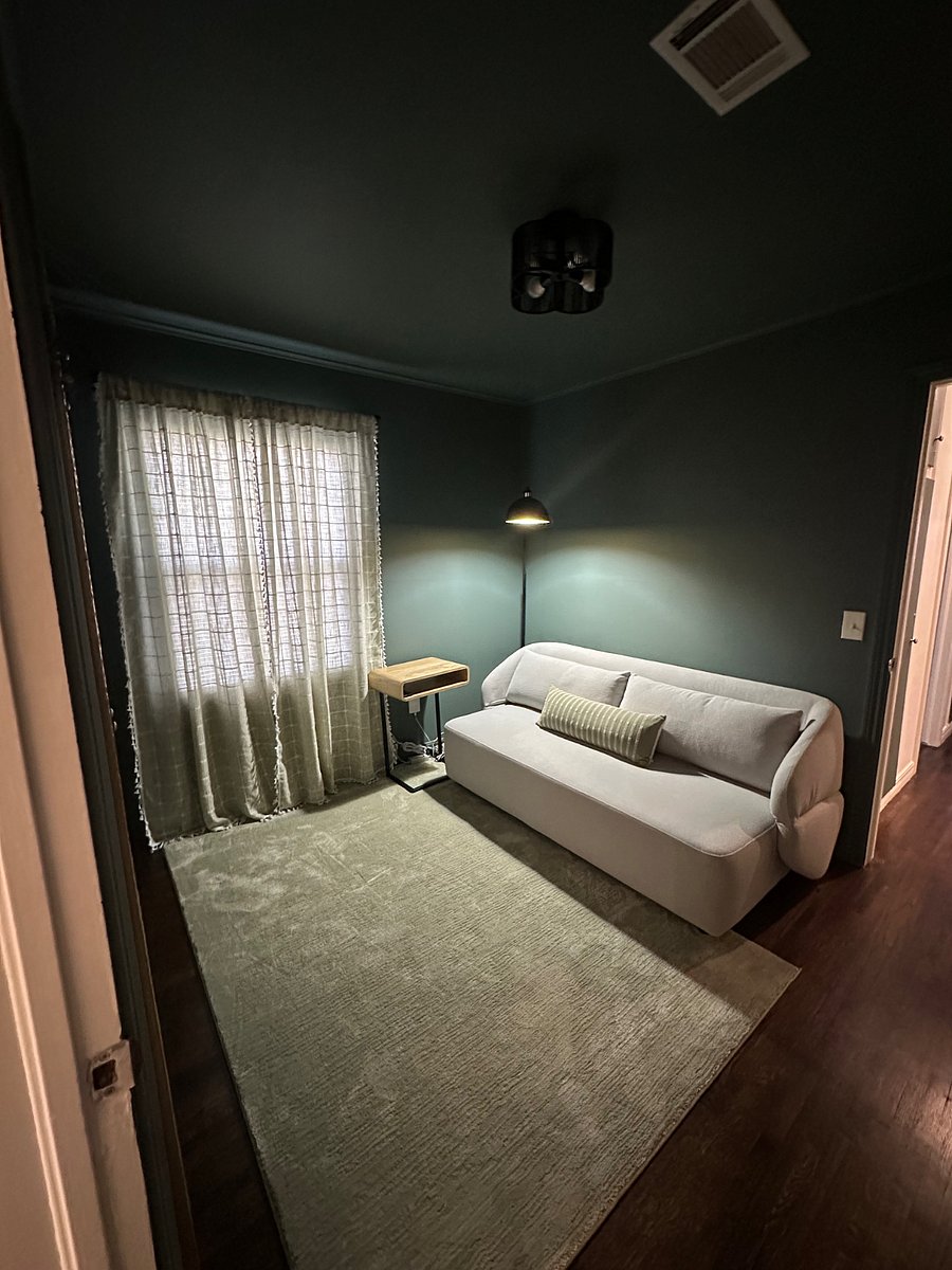 This room can be your home office, reading nook, or if you need a third bedroom the couch converts into a Queen size bed.