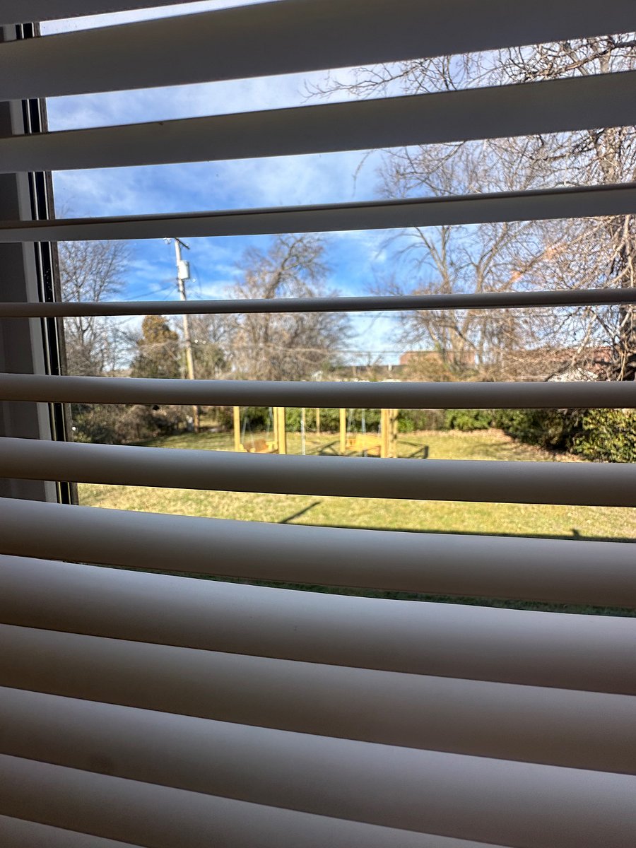 You can peep that fun outdoor swing/firepit from the bathroom window.