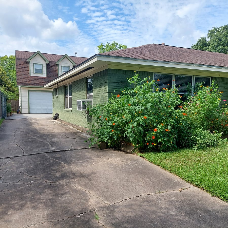 View of detached garage away from street.