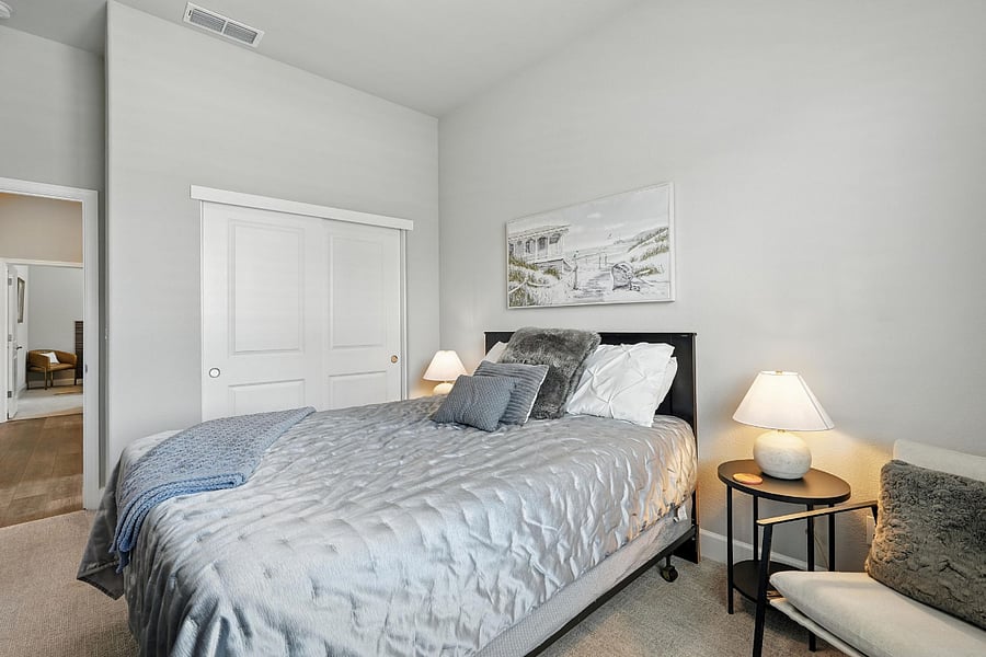 Bedroom # 2 - Queen Size Bed, dresser, nightstands w/ lamps, chair for sitting