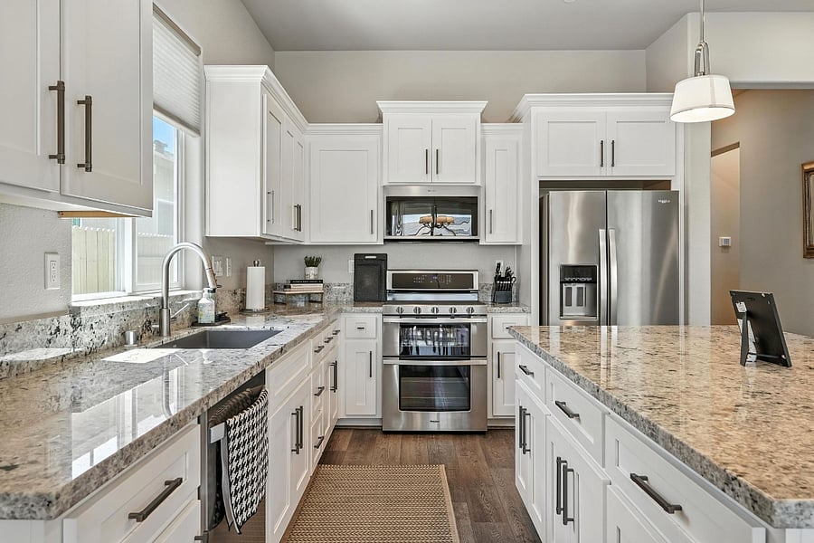 Kitchen - gas cooktop, double oven, microwave, dishwasher, full size fridge.