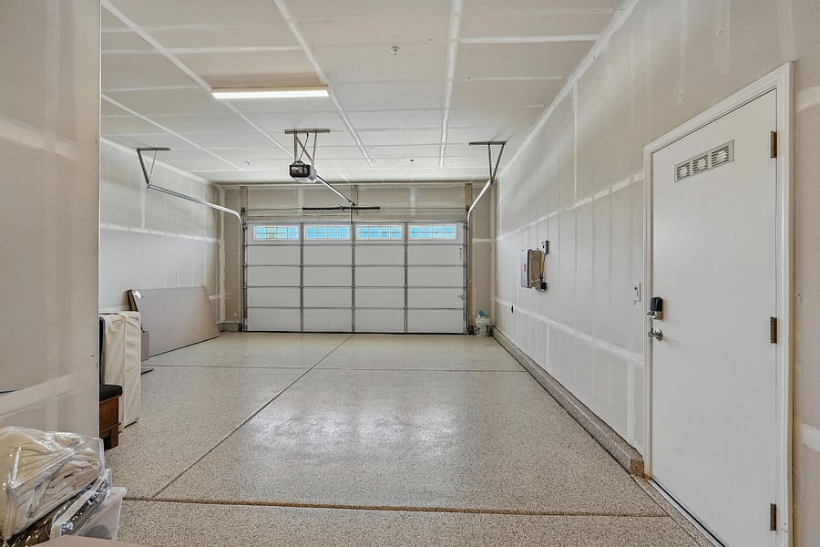 2 Car Garage w/ Tandem. Includes large storage racks (tandem section not showing pictures)