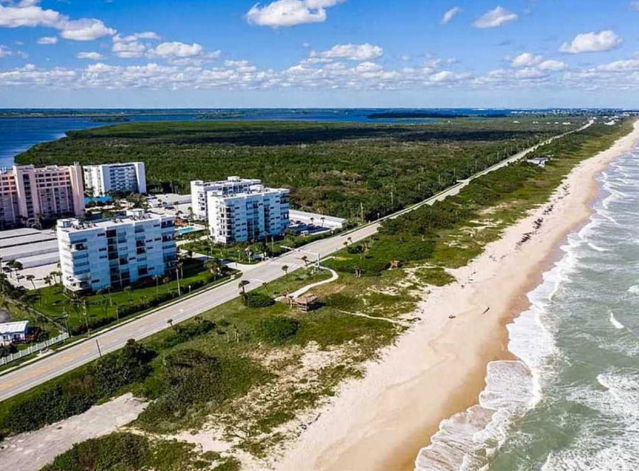 Beach with accessible walkways and tiki