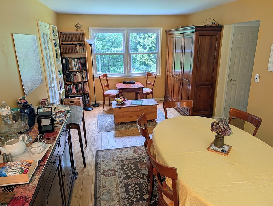 The dining room table expands to nearly double its length