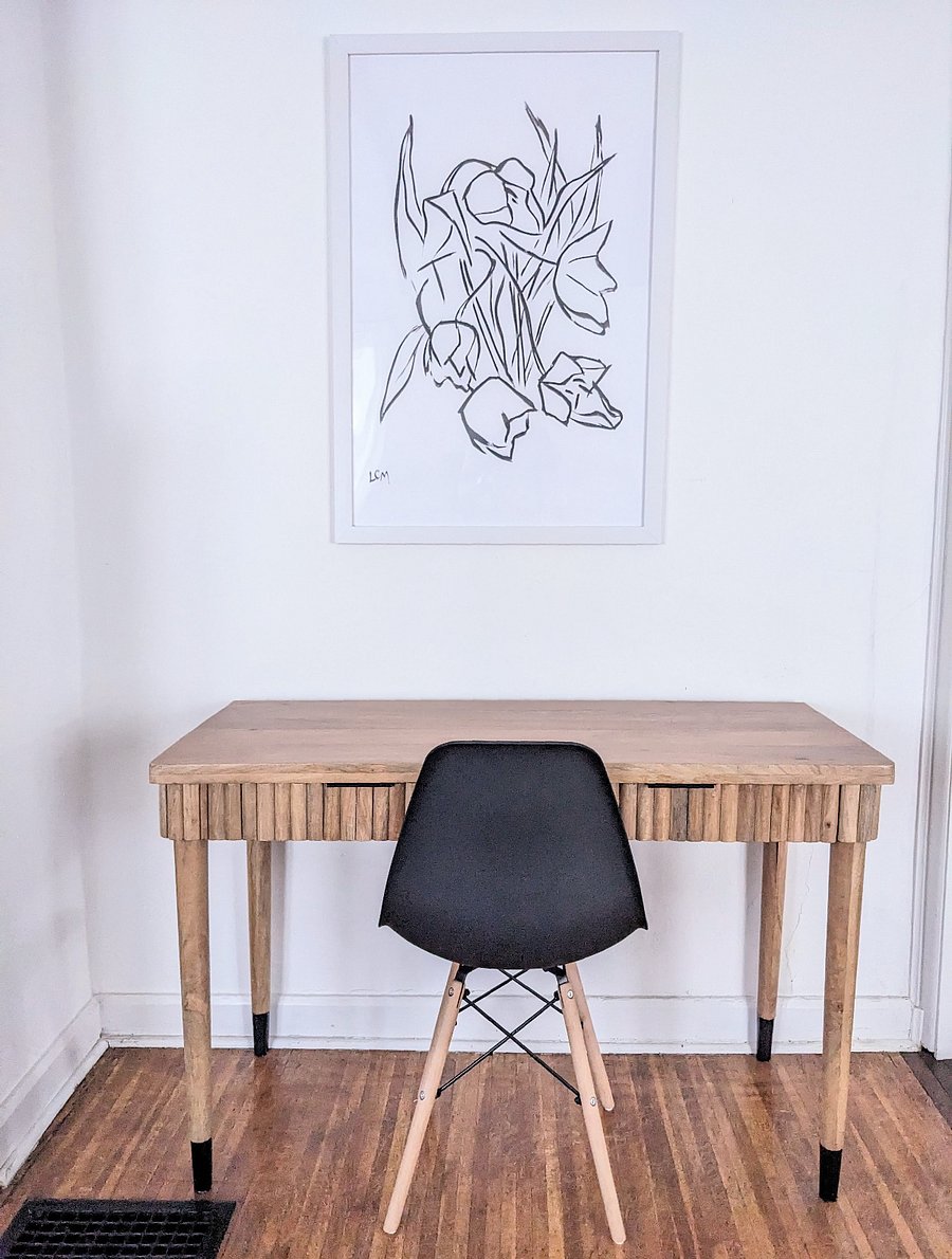 Dedicated workspace in living room. 3rd bedroom can be converted to dedicated office, if desired.