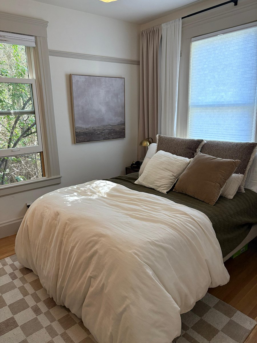 The primary bedroom is upstairs. It has a small closet and a dresser.
The bed is queen size.