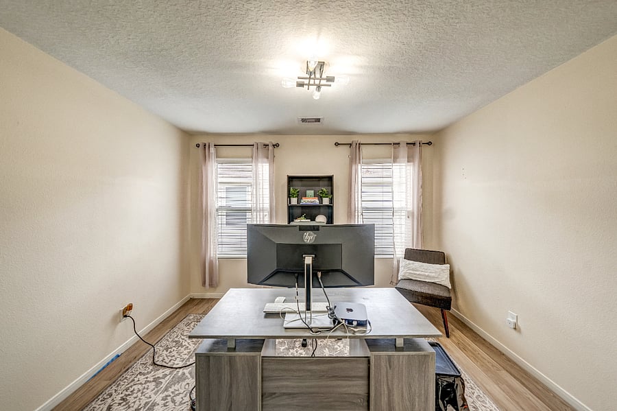 Dedicated workspace designed for productivity, featuring a comfortable desk area and a quiet environment ideal for remote work, studying, or video meetings.