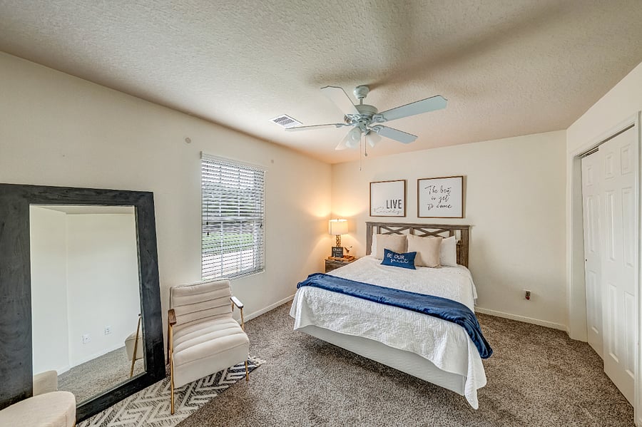 Comfortable guest bedroom with a Smart TV, closet space, and everything needed for a restful stay.