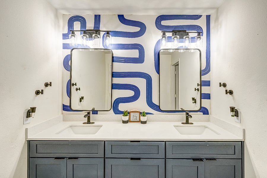 Clean and spacious full bathroom conveniently located for guests and additional bedrooms, offering both comfort and privacy.