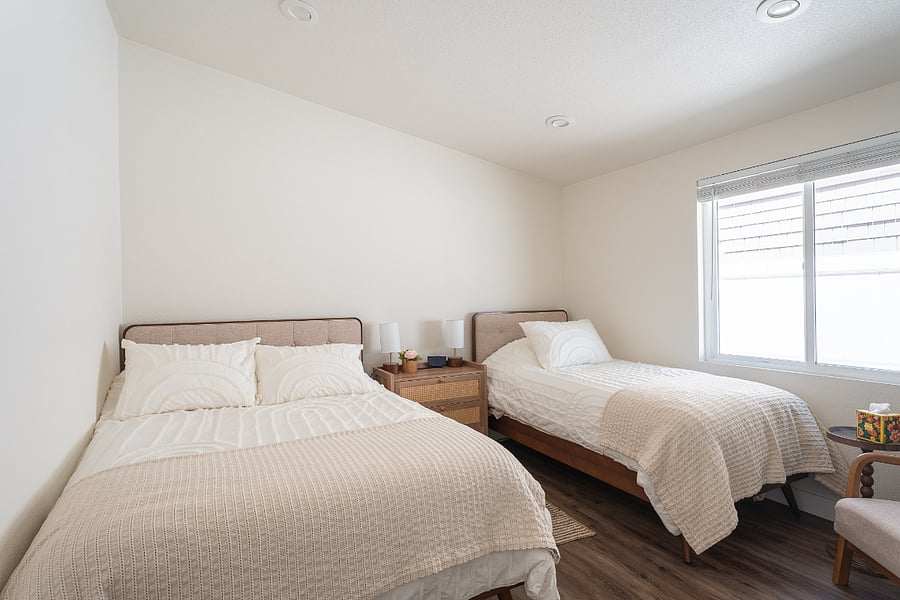 Second bedroom with one full bed and one twin bed