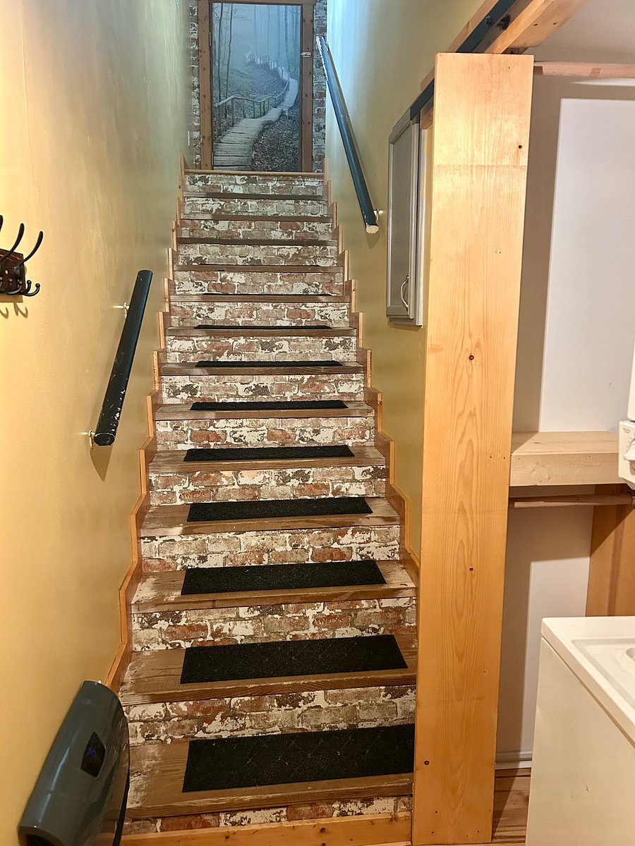 Apartment is upstairs with the laundry area downstairs