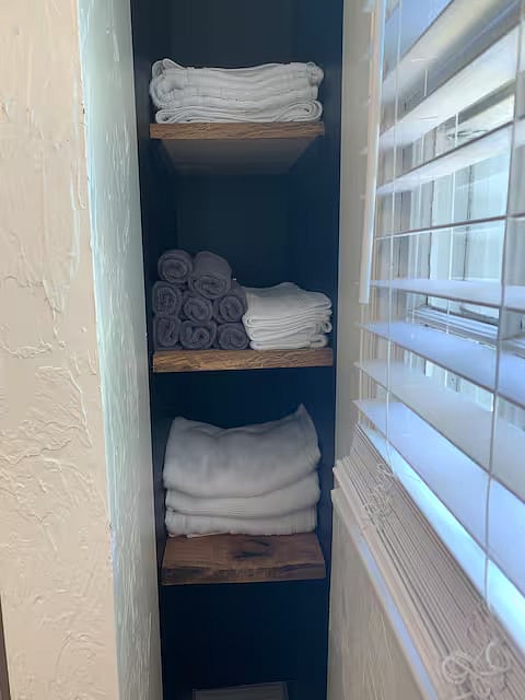 Linen shelves in Hall Bathroom
