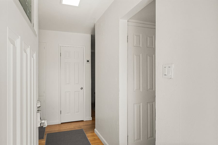 Hall way looking towards bedrooms and bathroom
