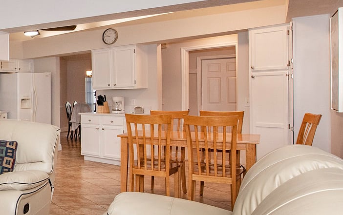 Casual dining area adjacent to kitchen.