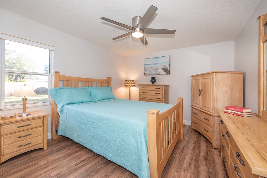 Bedroom 2 with queen bed and TV