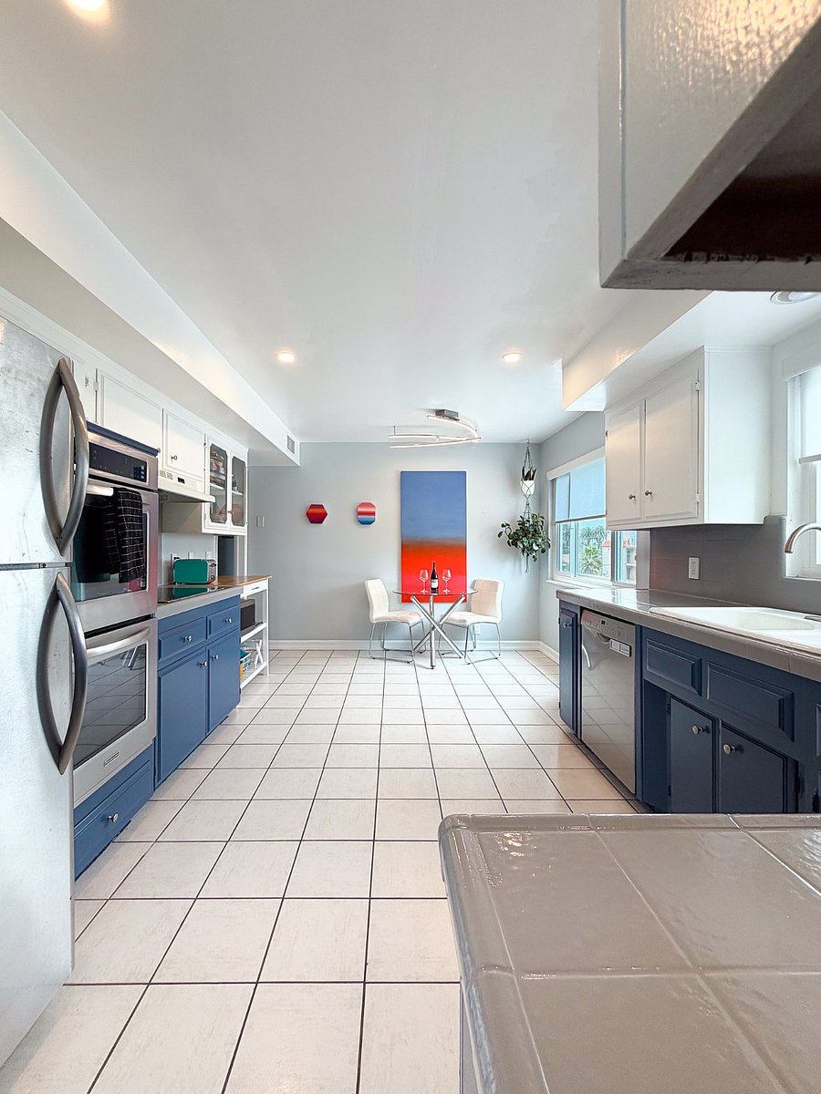 Kitchen with double oven, dishwasher, garbage disposal