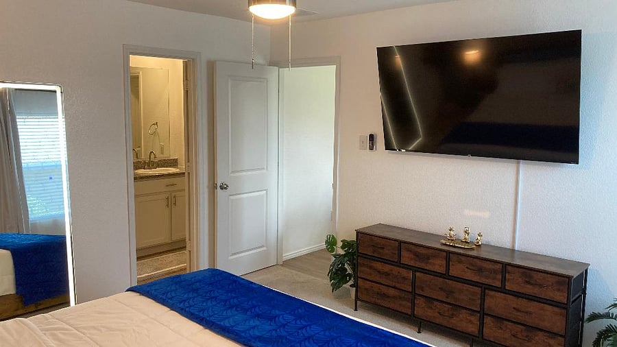 Master Bedroom is right off the dining room and has it's own Master Bathroom and Walk-In Closet.