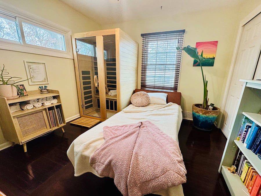 Bedroom 3: Versatile third bedroom + dedicated workspace featuring a two-person infrared sauna, spacious desk setup, and a fold-out twin bed for flexible sleeping.