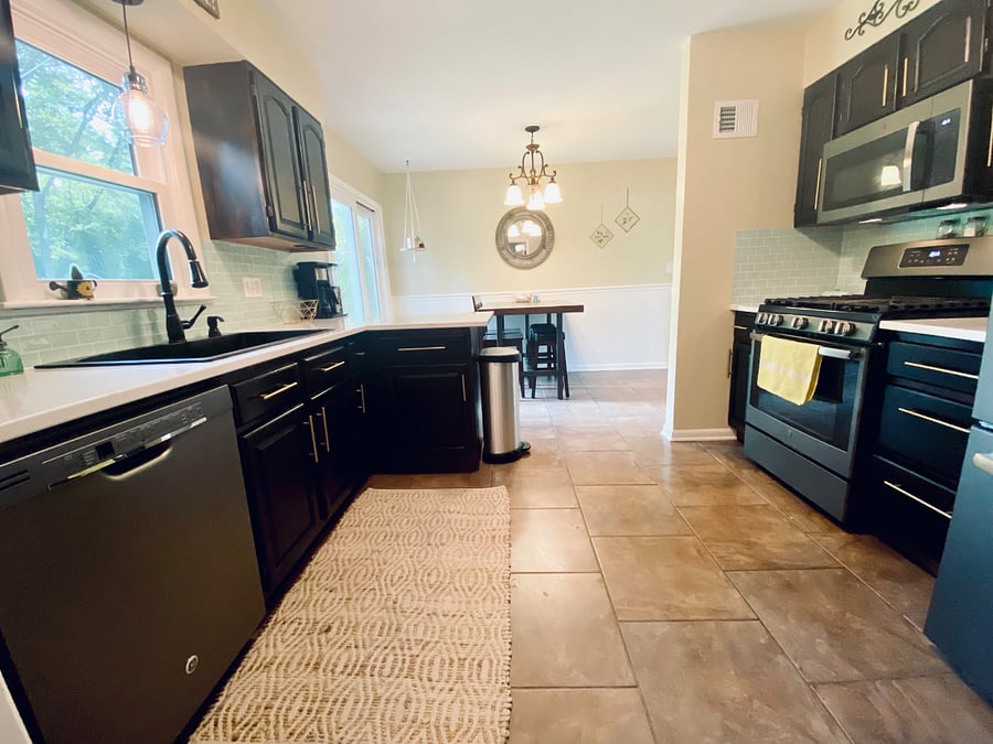 Updated, fully stocked kitchen with modern appliances, quartz countertops, and plenty of space.
Stand mixer, air fryer, and other small appliances included.