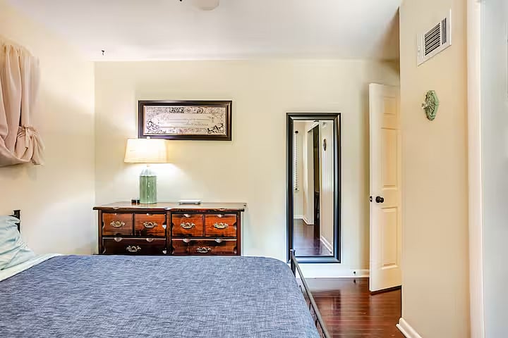Bedroom 1: Cozy, lightfilled bedroom with queen bed and plenty of space to settle in.