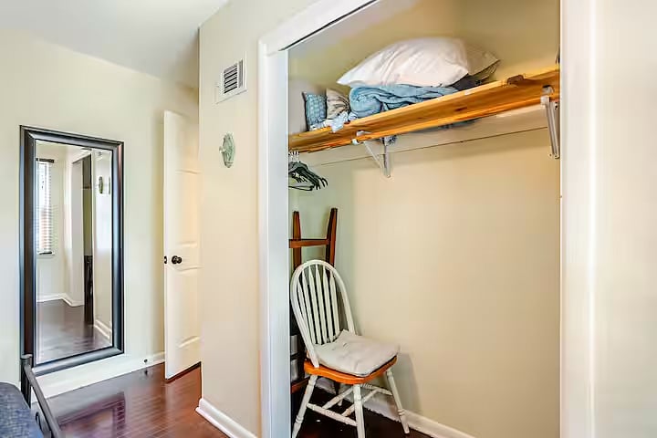 Bedroom 1: Cozy, lightfilled bedroom with queen bed and plenty of space to settle in.