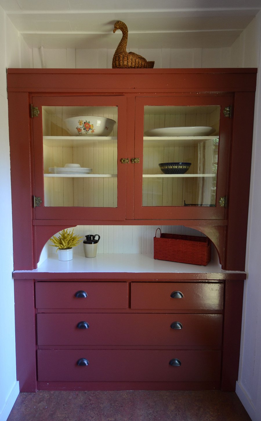 Built-in pantry across from laundry