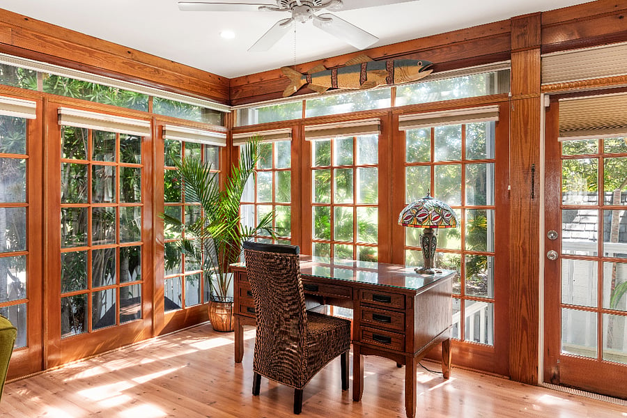 Sunroom with desk and chair