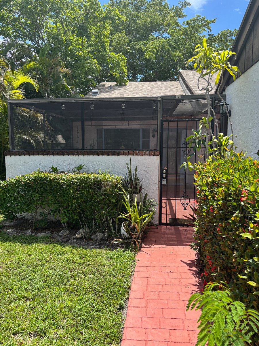 Private entry with screened in patio.