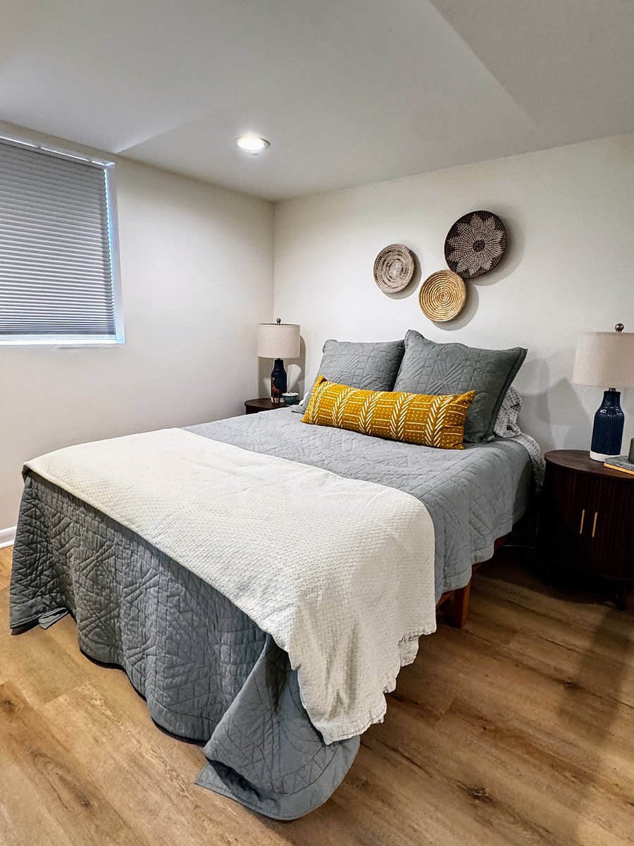 The blackout shade in bedroom helps keep the sun our of your room.