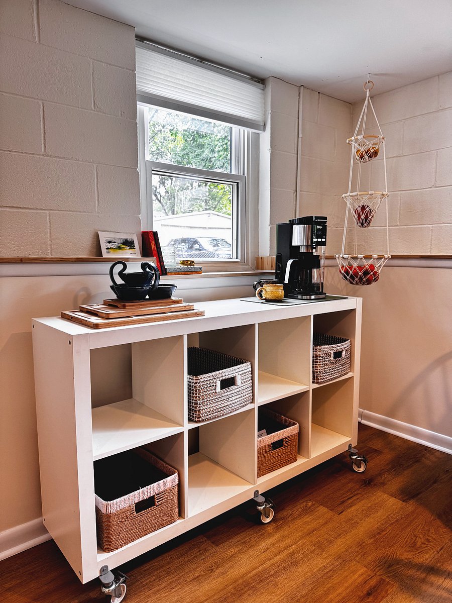 Kitchen storage with coffee maker.