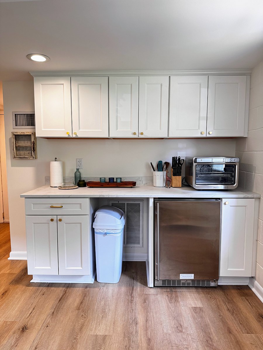 Kitchenette with mini fridge and toaster oven.
