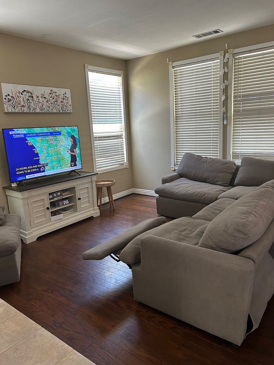small Living room with couch and tv.