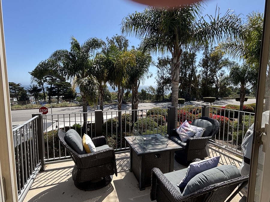 2nd floor balcony with fire pit and BBQ and a view of the Pismo Pier