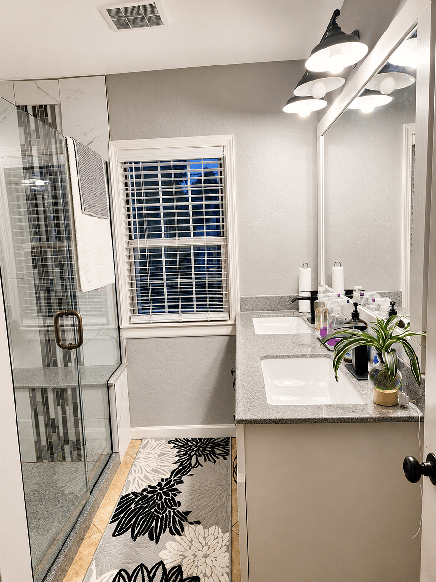 Updated Bathroom with Walk-In Tile Shower and double vanity