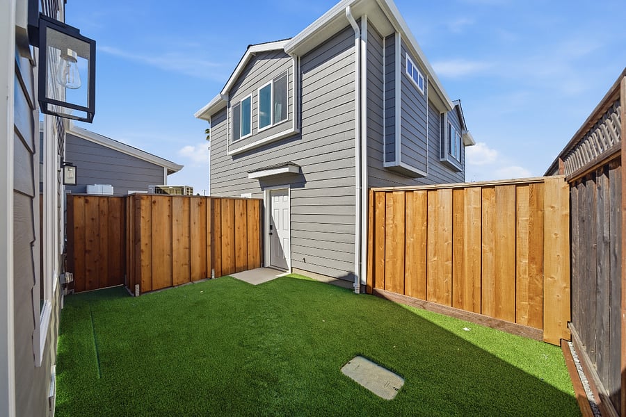 Dedicated private backyard space with entrance to home or garage