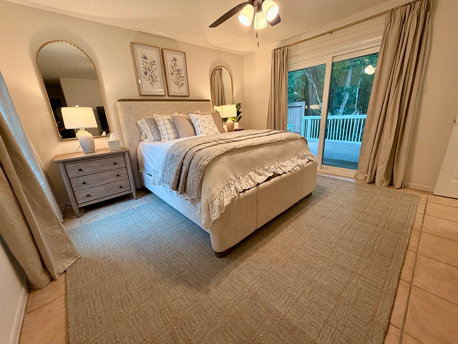 Master bedroom features black out curtains and white noise machine with a Smart TV