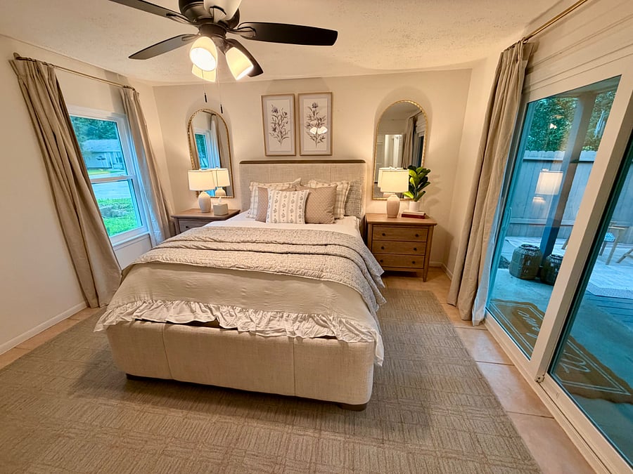 Master bedroom features black out curtains and white noise machine with a Smart TV