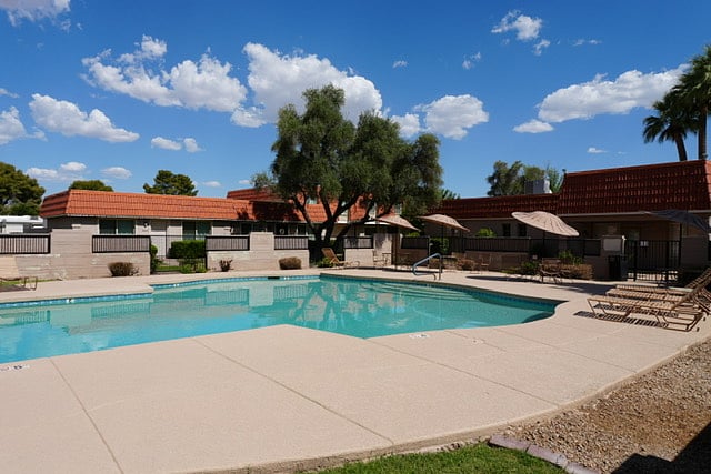 Community Pool & Large Grass Area Located +/- 25 Yards from Condo