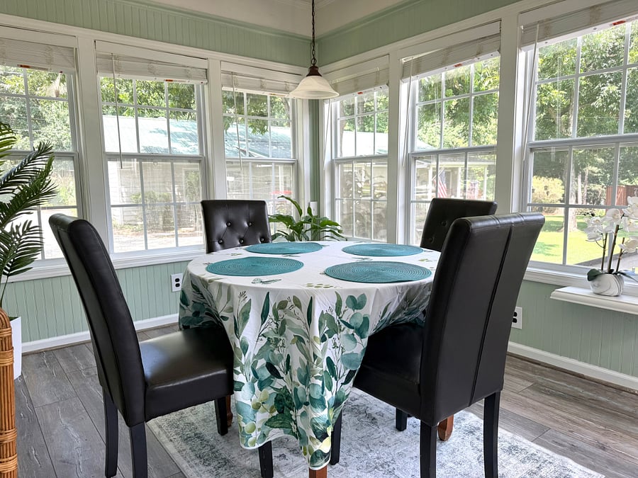 Gorgeous dining room adds sunshine and cozy comfort.
