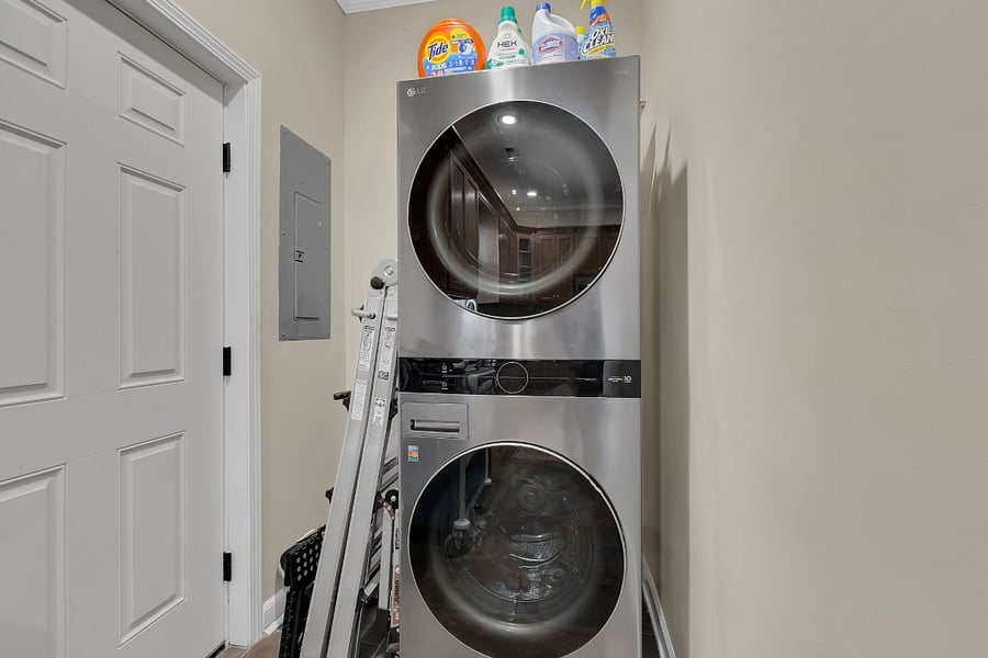 Brand new washer and dryer unit just off the kitchen (the door to the left in this photo goes out to the back patio and fenced-in back yard).