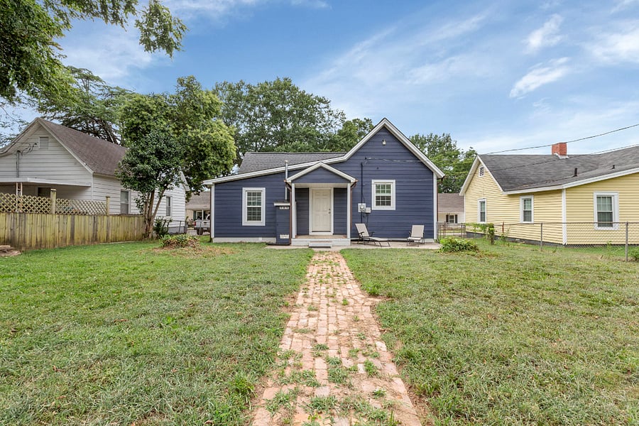 Fenced-in backyard, great for canine companions (we love dogs!)