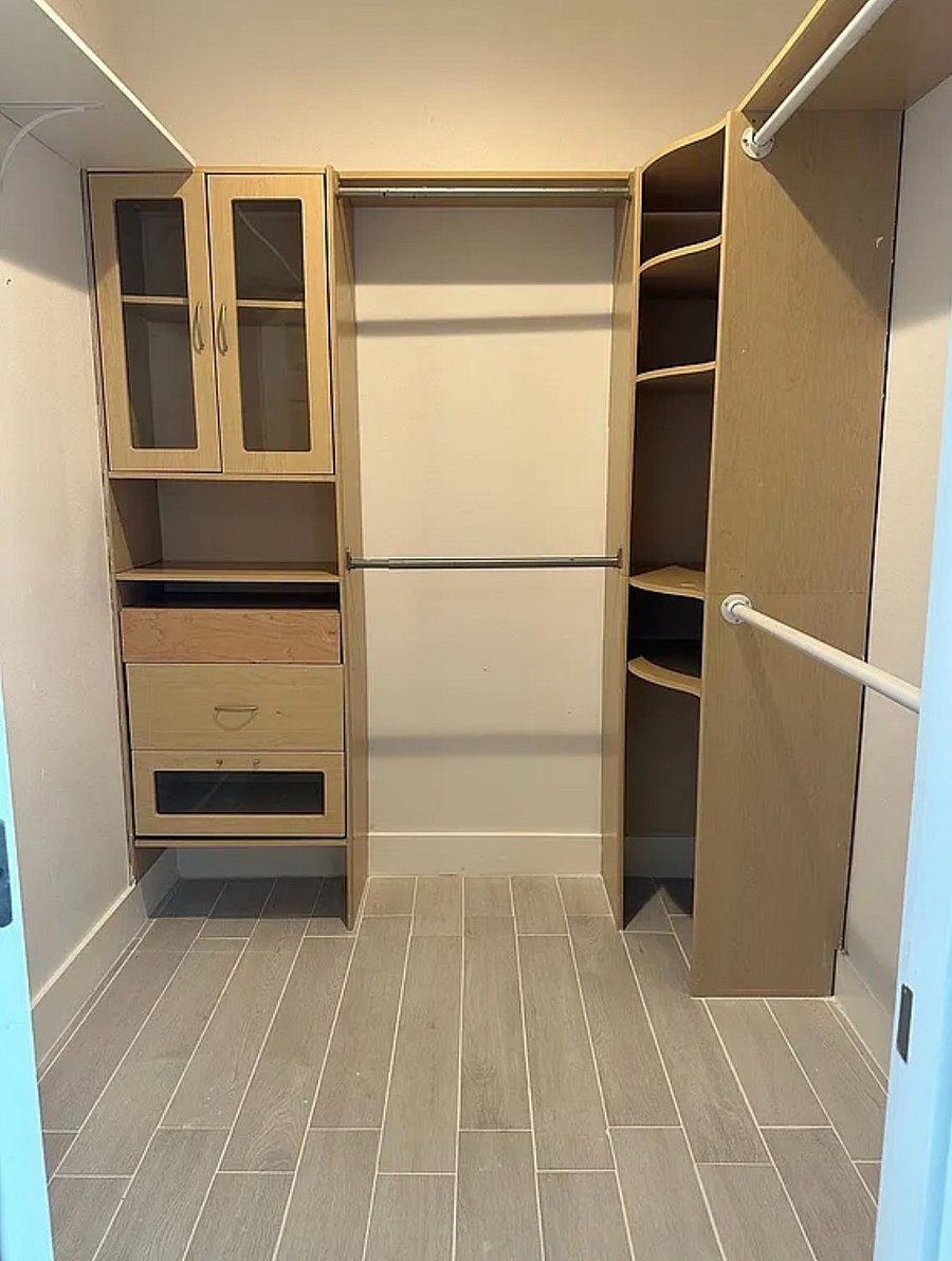 Primary Bedroom walk in closet